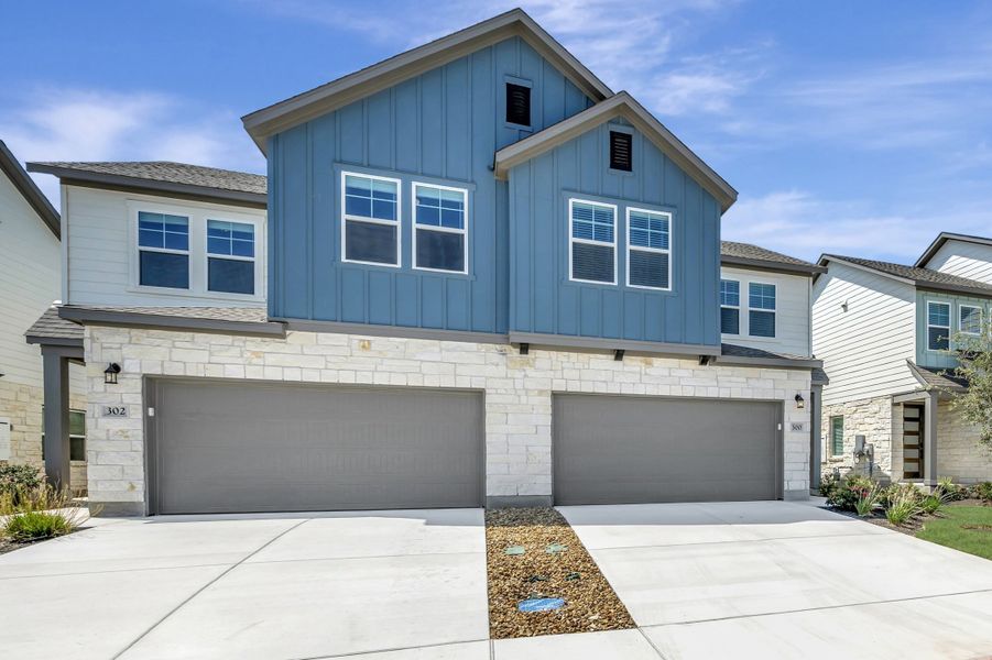 Front exterior of a new home in Park Central, Georgetown, TX, highlighting curb appeal (Image 24). Front exterior of a new home in Park Central, Georgetown, TX, highlighting curb appeal (Image 24).