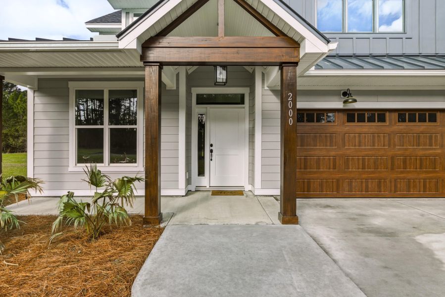 Exterior details and patio area of a home in , Johns Island (Image 3).