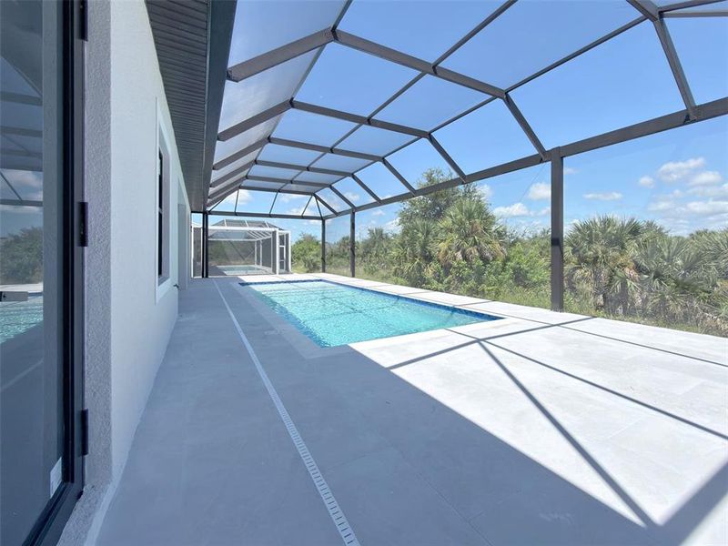 Exterior details and patio area of a home in , Port Charlotte (Image 24).