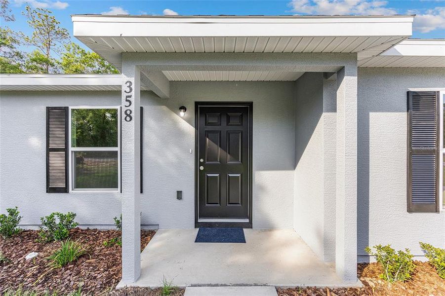 Exterior details and patio area of a home in , Ocala (Image 17).