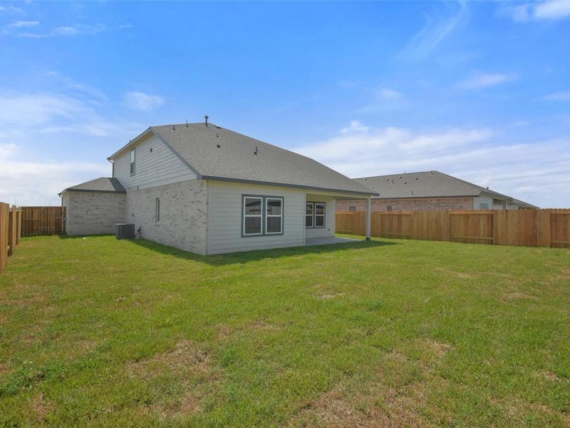 Exterior details and patio area of a home in River Ranch Meadows, Dayton (Image 20).