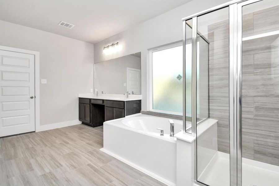 Example of completed home with similar plan. As-built colors and selections may vary.