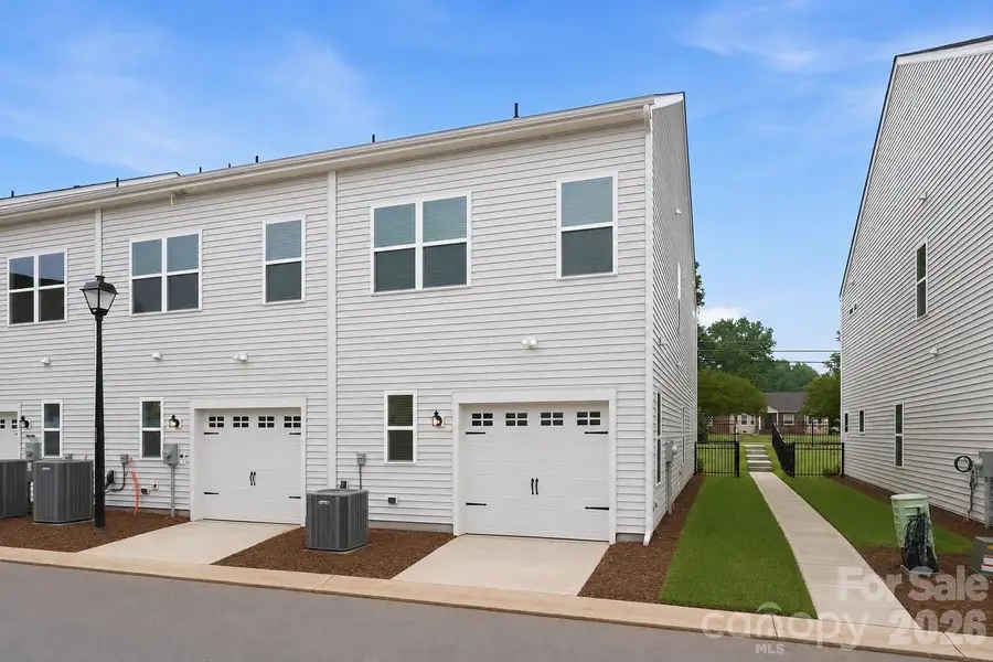 Exterior details and patio area of a home in Sloan Station, Charlotte (Image 3).