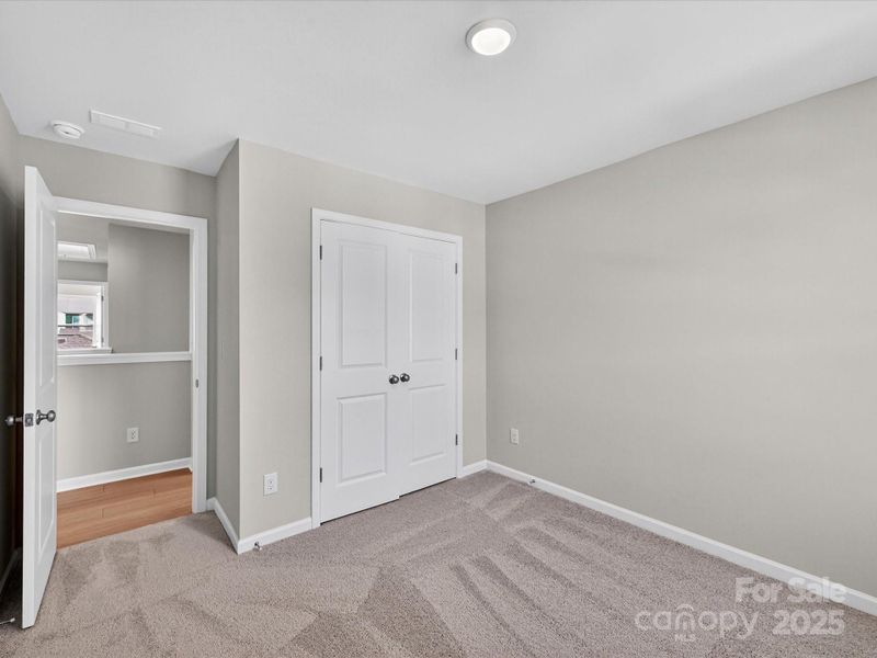 Spacious, unfurnished interior of a new home in North Creek Village - Townhomes, Huntersville (Image 28).