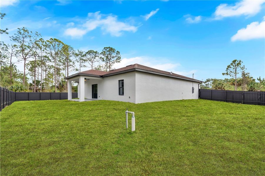 Exterior details and patio area of a home in , Lehigh Acres (Image 25).