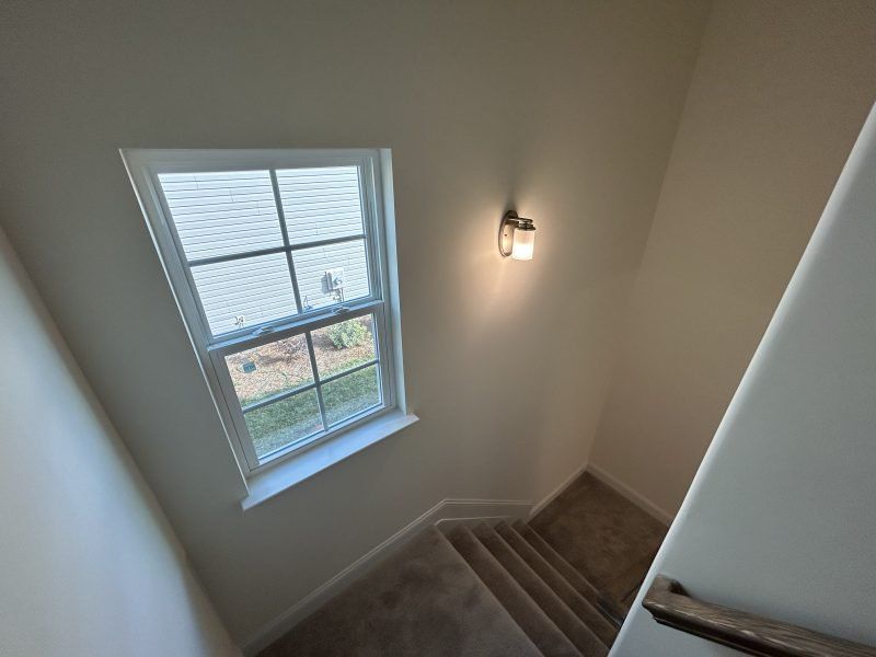 Spacious, unfurnished interior of a new home in Miller's Reserve, Winston-Salem (Image 41).