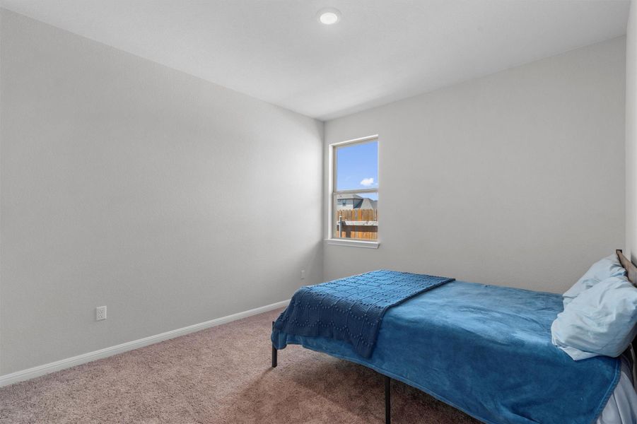 Furnished interior view inside a new home in The Ridge at Trinity Ranch, Elgin (Image 17).