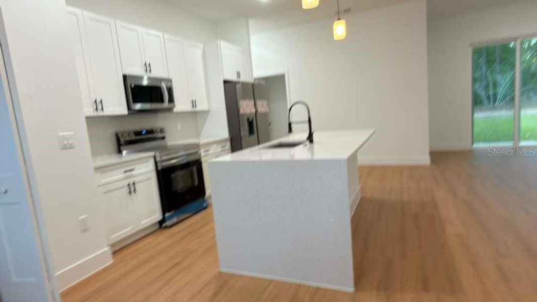 Furnished interior view inside a new home in , Citrus Springs (Image 11).