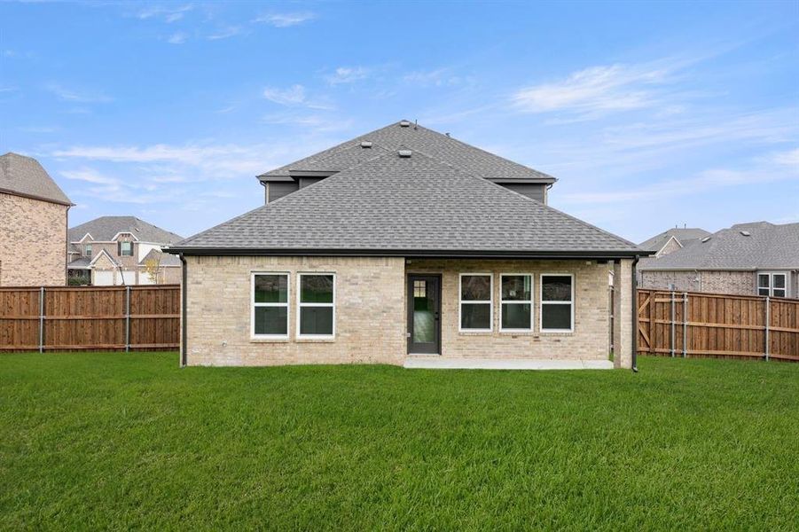 Exterior details and patio area of a home in Grayhawk Addition, Forney (Image 26).