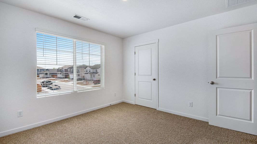 Spacious, unfurnished interior of a new home in Vista Meadows, Fort Lupton (Image 36).