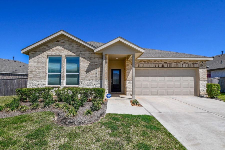 Front exterior of a new home in Anniston, Katy, TX, highlighting curb appeal (Image 24). Front exterior of a new home in Anniston, Katy, TX, highlighting curb appeal (Image 24).