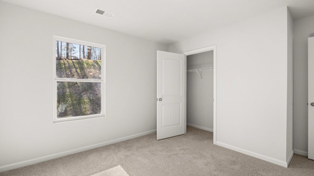 Representative unfurnished interior of a home built from the Hayden by D.R. Horton in Aurora Creek, Dallas (Image 29).