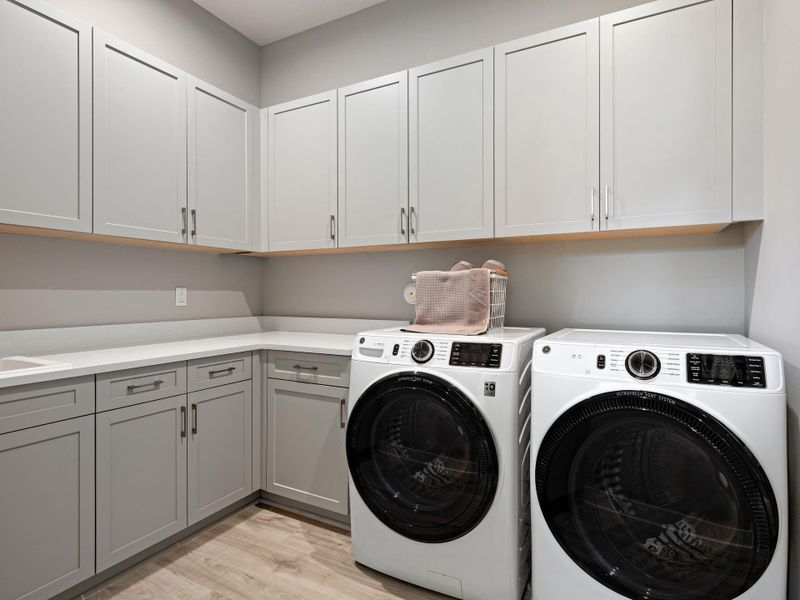 Furnished interior view inside a new home in PGA Village Verano, Port St. Lucie (Image 10).
