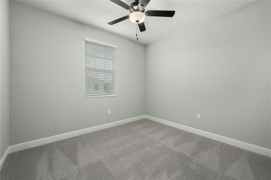 Spacious, unfurnished interior of a new home in Reunion Village, Kissimmee (Image 21).