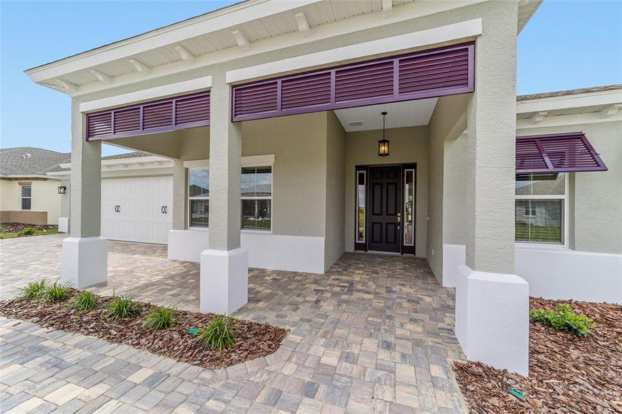 Front exterior of a new home in On Top of the World Communities, Ocala, FL, highlighting curb appeal (Image 23).
