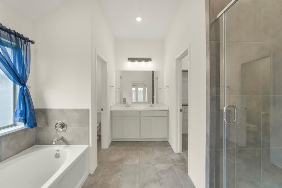Furnished interior view inside a new home in Bridgeland, Cypress (Image 11).