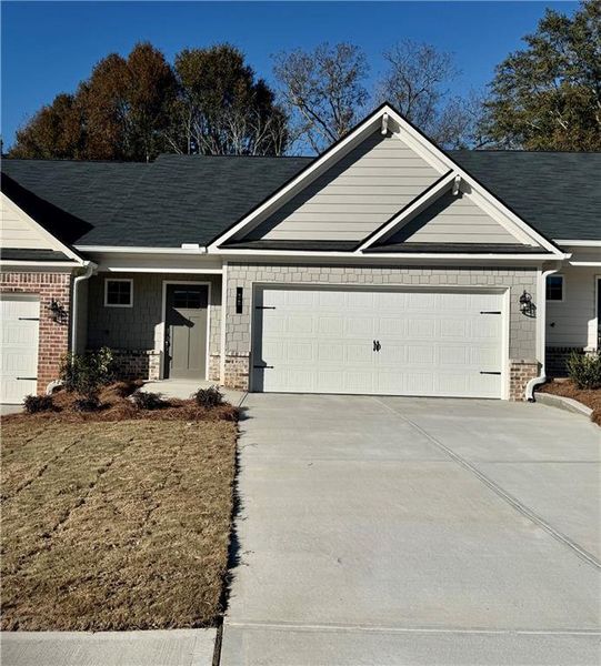 Front exterior of a new home in Silver Leaf, Dawsonville, GA, highlighting curb appeal (Image 1).