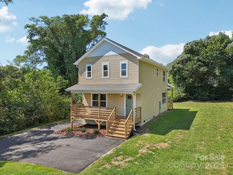 Front exterior of a new home in , Asheville, NC, highlighting curb appeal (Image 20).