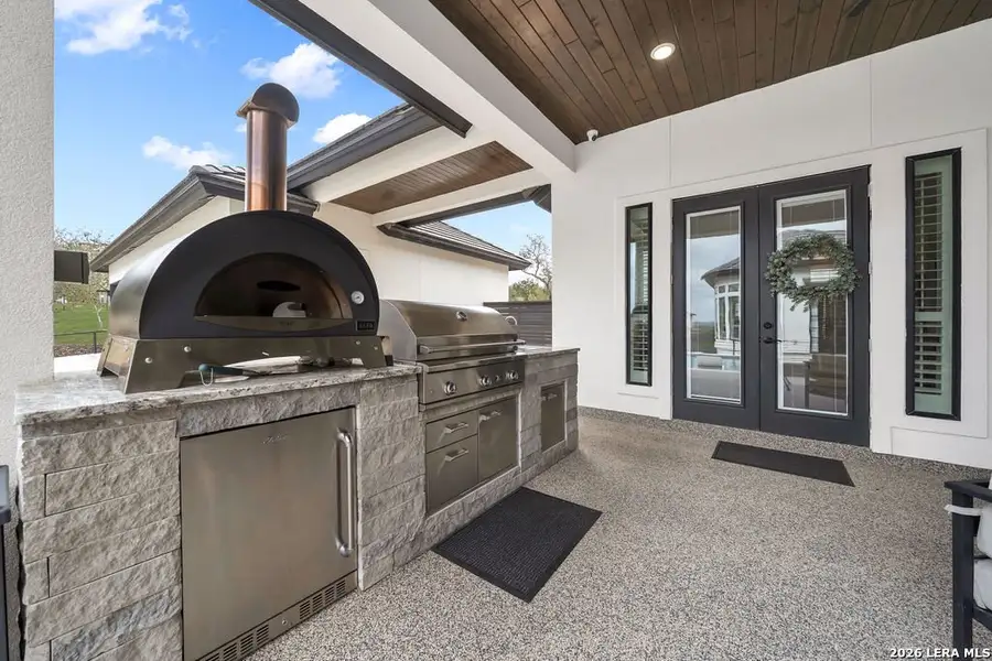 Exterior details and patio area of a home in , New Braunfels (Image 4).