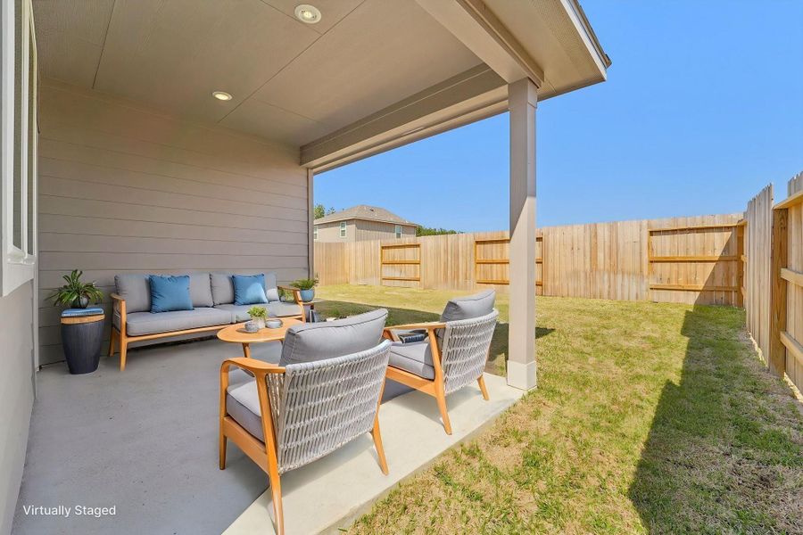 Exterior details and patio area of a home in Landing Meadows - Traditional Series, New Caney (Image 21).