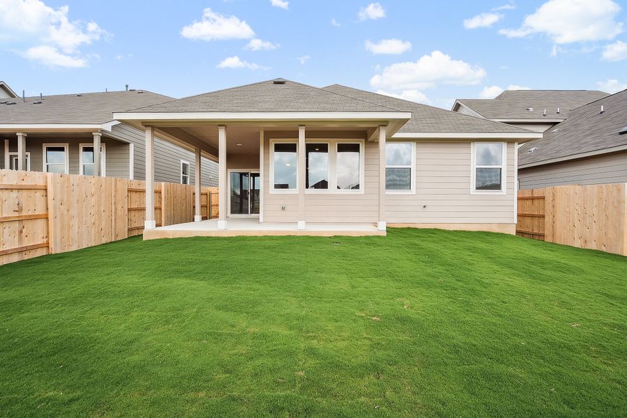 Representative exterior photo of a completed home built from the Blake by Ashton Woods in Rolling Glen, Hutto, TX (Image 28).