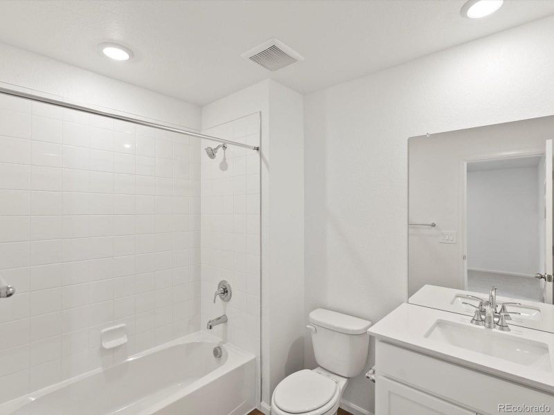 Furnished interior view inside a new home in Skyview at High Point, Aurora (Image 9).