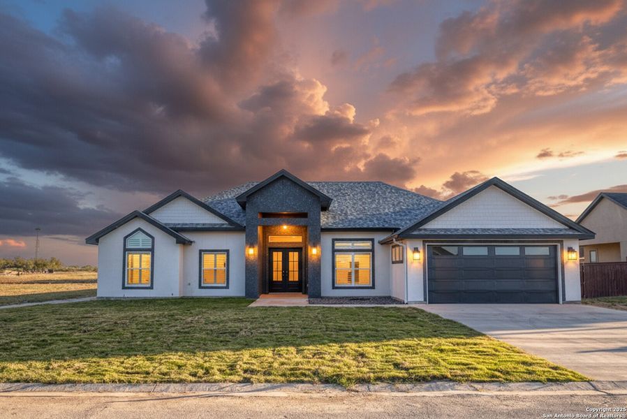 Front exterior of a new home in , Uvalde, TX, highlighting curb appeal (Image 24).