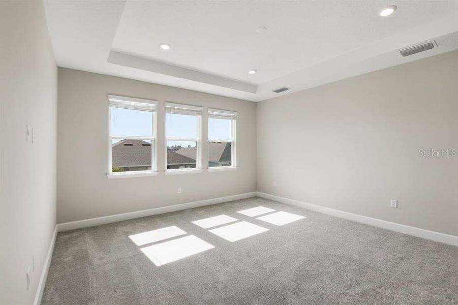 Spacious, unfurnished interior of a new home in Harvest at Ovation, Winter Garden (Image 25).