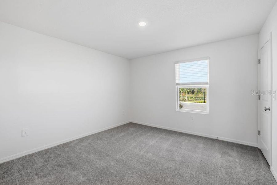 Spacious, unfurnished interior of a new home in The Towns at Firethorn, Parrish (Image 30).