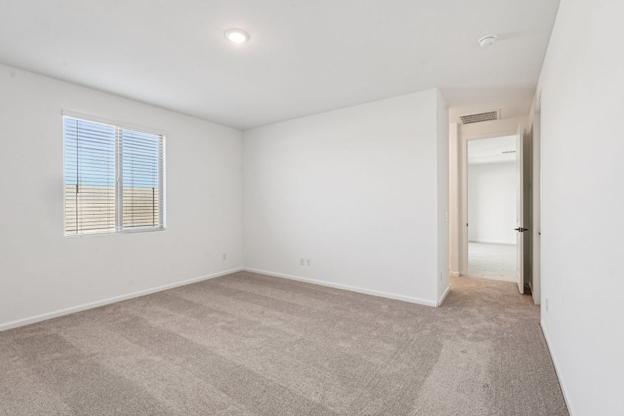 Primary suite. Finishes and options may vary by community