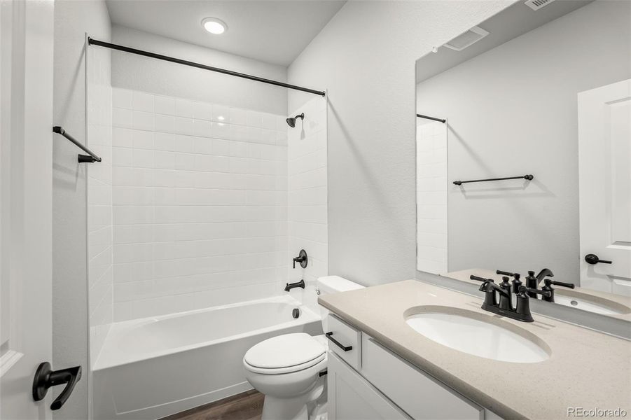 Furnished interior view inside a new home in Revel Crossing at Wolf Ranch – The Outlook Collection, Colorado Springs (Image 15).