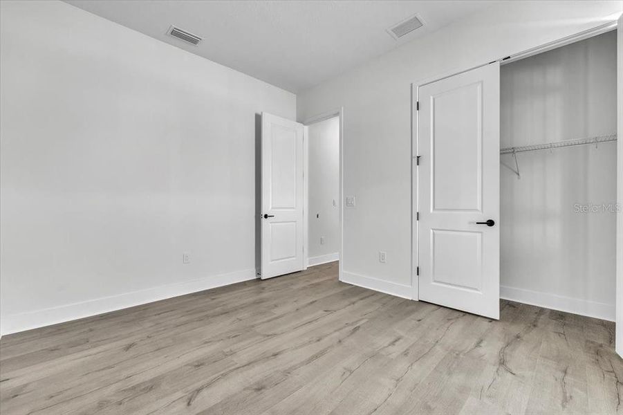 Spacious, unfurnished interior of a new home in Gracewater at Sarasota, Sarasota (Image 21).