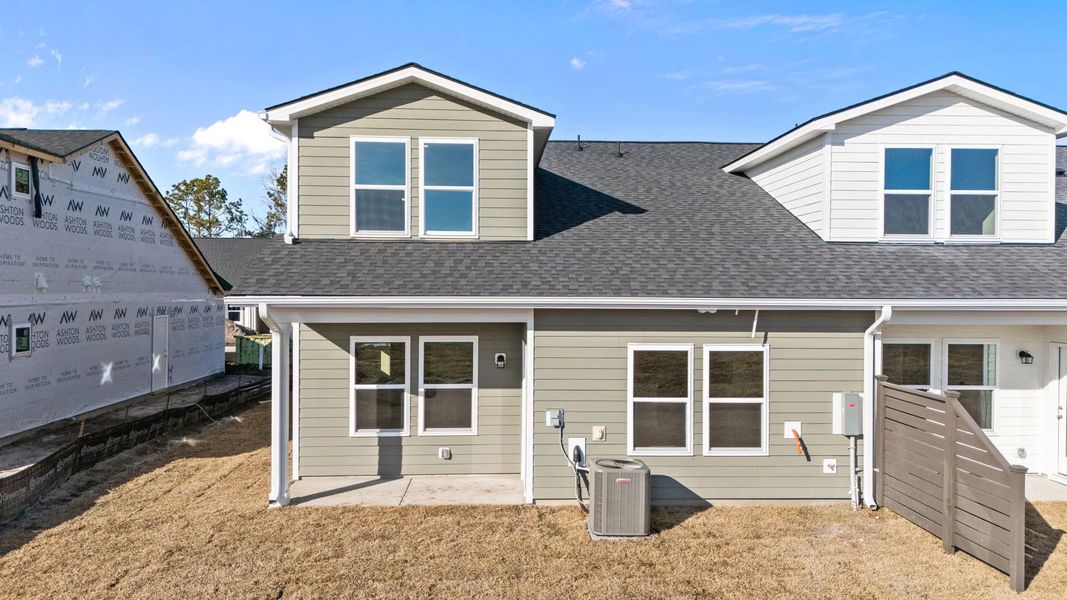 Exterior details and patio area of a home in Blue Heron Retreat, Little River (Image 18).