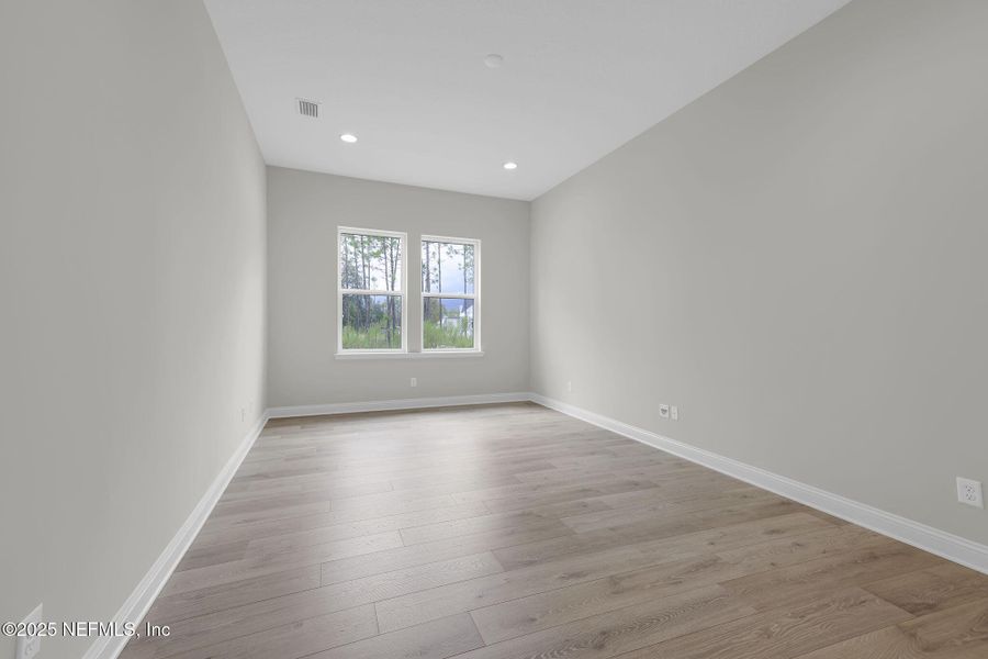 Spacious, unfurnished interior of a new home in Hidden Creek at SilverLeaf 70' Series, St. Augustine (Image 22).
