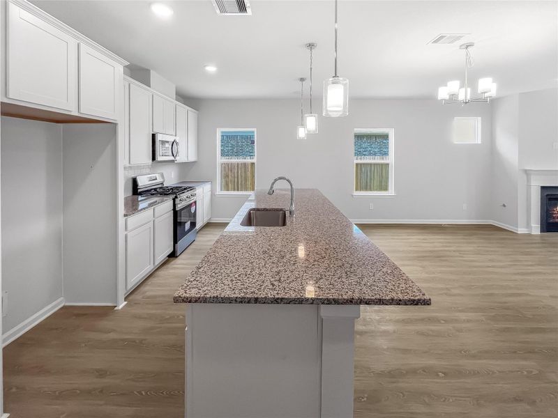 Furnished interior view inside a new home in Sierra Vista, Iowa Colony (Image 4).