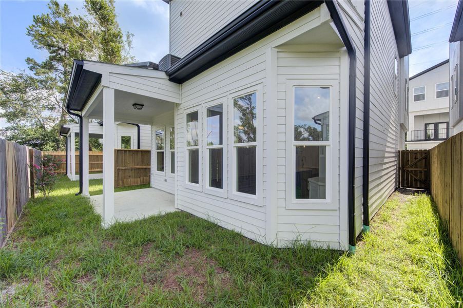 Exterior details and patio area of a home in , Houston (Image 3).