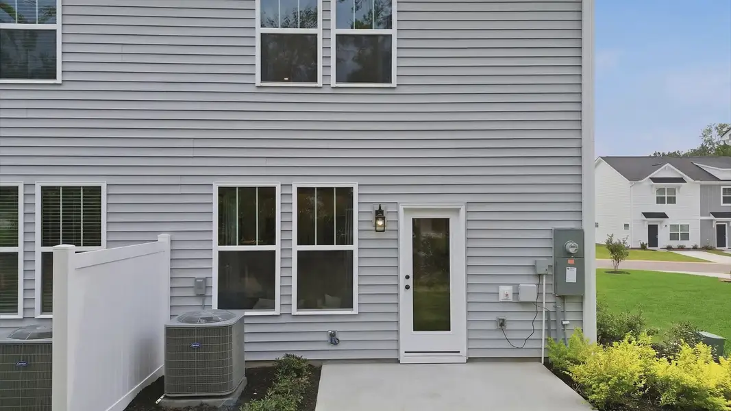 Exclusive backyard with accomplished detail and elevated outdoor living potential at Clarke Townes