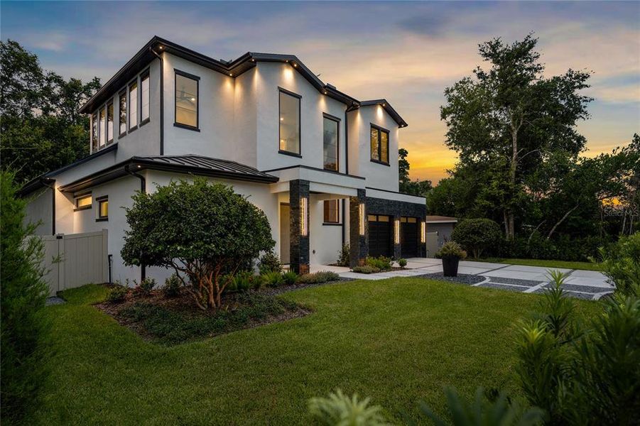 Front exterior of a new home in , Winter Park, FL, highlighting curb appeal (Image 21). Front exterior of a new home in , Winter Park, FL, highlighting curb appeal (Image 21).