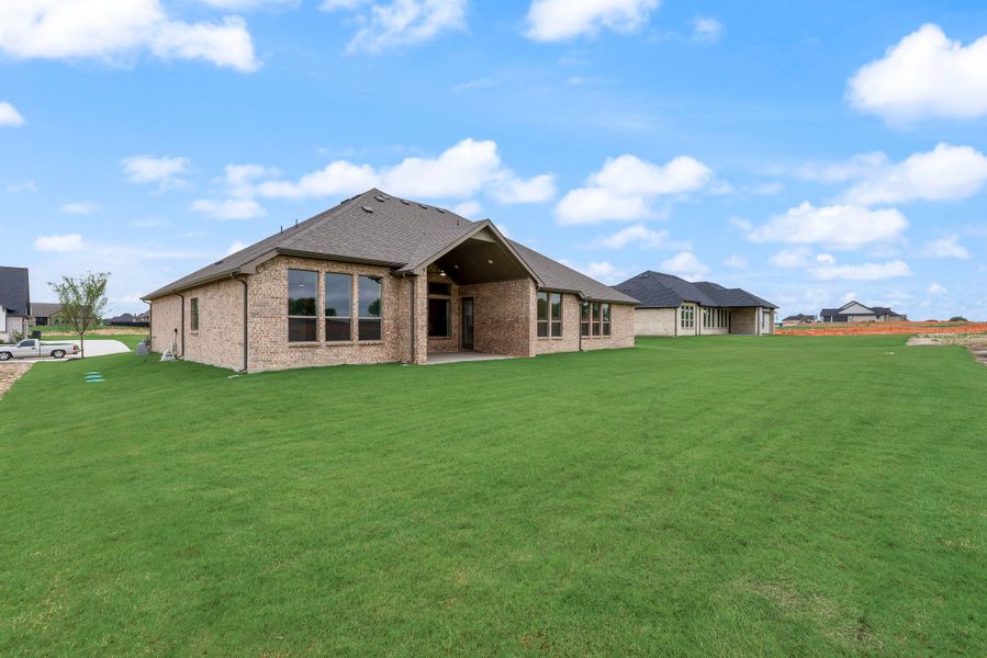 Exterior details and patio area of a home in Paloma Ranch, New Fairview (Image 4).