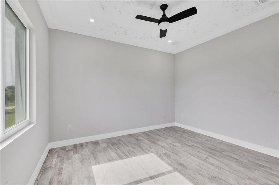 Spacious, unfurnished interior of a new home in , Port Charlotte (Image 14).