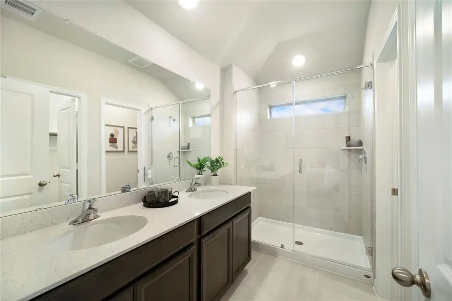 Sample photo of completed home with similar floor plan. As-built color and selections may vary.