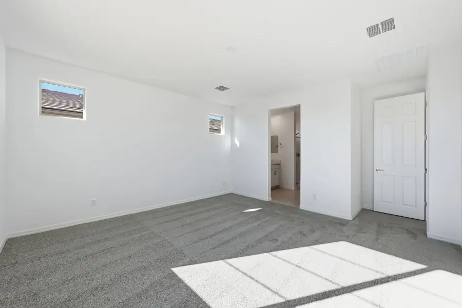Spacious, unfurnished interior of a new home in Empire Pointe, Queen Creek (Image 12).