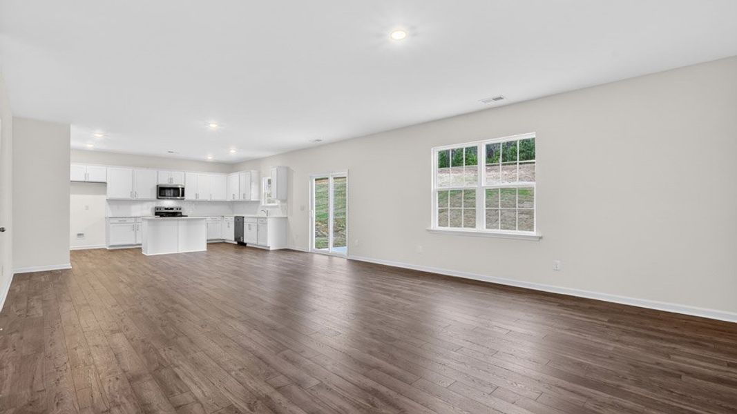 Spacious, unfurnished interior of a new home in Gretchen Pines, West End (Image 20).