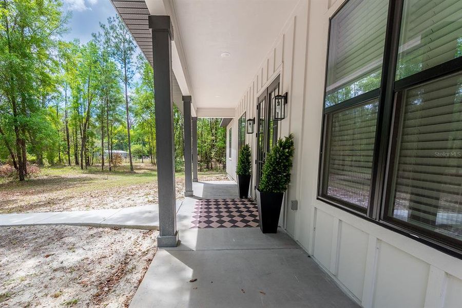 Exterior details and patio area of a home in , Fort White (Image 27).