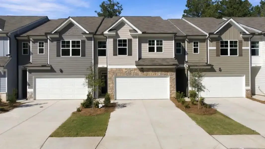 Front exterior of a new home in Hughes Court, Dawsonville, GA, highlighting curb appeal (Image 2). Front exterior of a new home in Hughes Court, Dawsonville, GA, highlighting curb appeal (Image 2).
