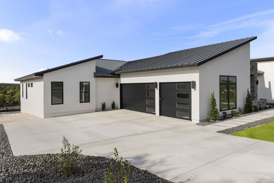 Front exterior of a new home in , San Antonio, TX, highlighting curb appeal (Image 21). Front exterior of a new home in , San Antonio, TX, highlighting curb appeal (Image 21).