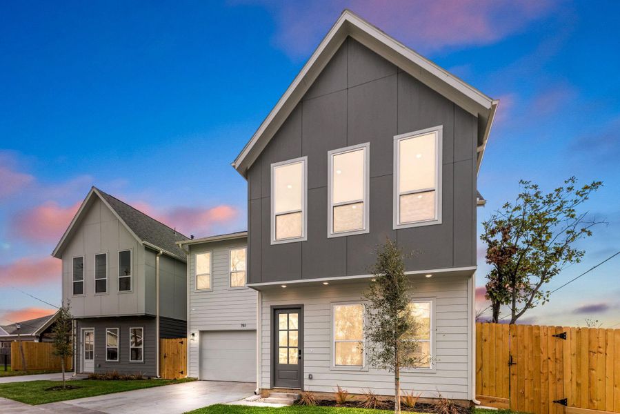 Welcome to 751 Dumble Street, a modern masterpiece nestled on a quiet corner lot in Houston’s dynamic EaDo District—just minutes from Downtown! This stunning home boasts exceptional curb appeal, a sleek contemporary design, and a private double-wide driveway. The inviting entryway, featuring an elegant glass-detailed front door, sets the tone for the stylish interiors within. Enjoy a beautifully designed, low-maintenance lawn, perfect for effortless living. Welcome to 751 Dumble Street, a modern masterpiece nestled on a quiet corner lot in Houston’s dynamic EaDo District—just minutes from Downtown! This stunning home boasts exceptional curb appeal, a sleek contemporary design, and a private double-wide driveway. The inviting entryway, featuring an elegant glass-detailed front door, sets the tone for the stylish interiors within. Enjoy a beautifully designed, low-maintenance lawn, perfect for effortless living.
