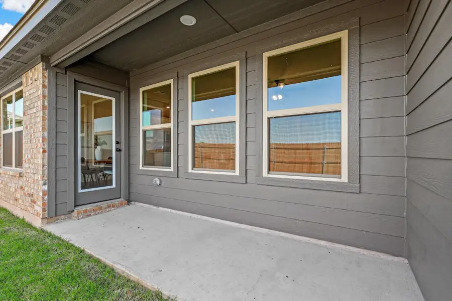 Representative exterior details of a home built from the Essex by Cheldan Homes in Stoneview, Glen Rose (Image 4).