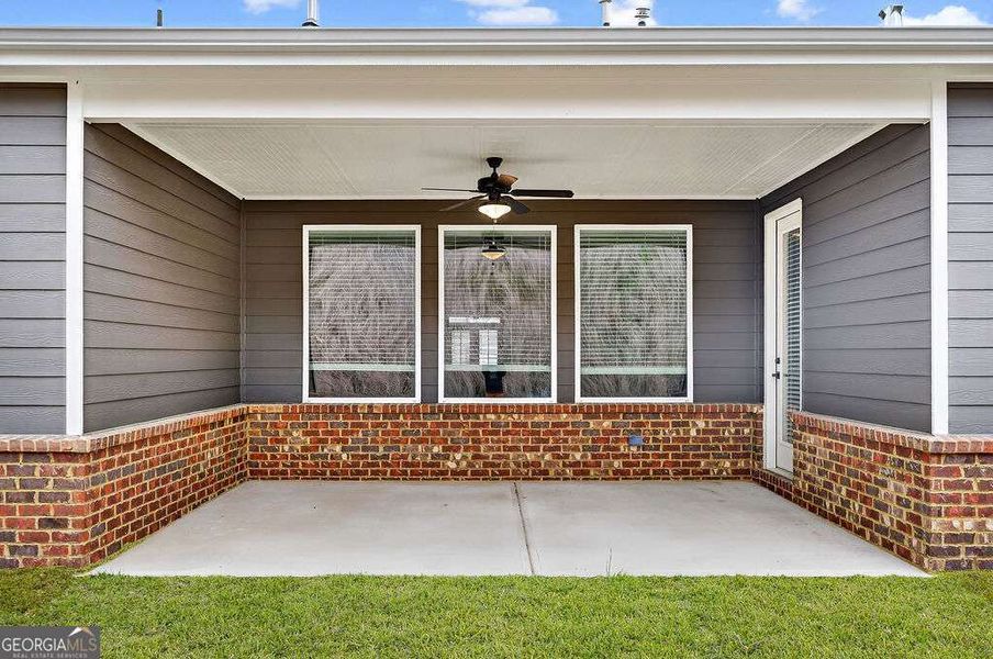 Exterior details and patio area of a home in The Manor at Gainesville Township, Gainesville (Image 4).