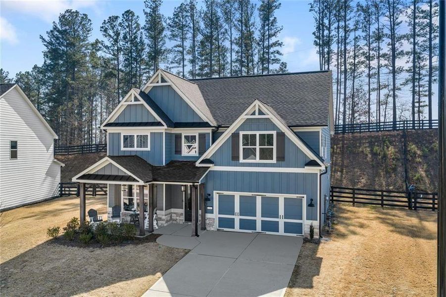 Front exterior of a new home in , Dallas, GA, highlighting curb appeal (Image 24).